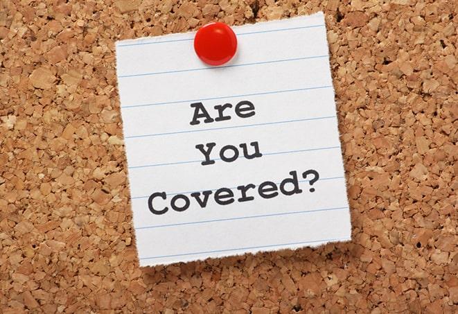 a motorcycle insurance agent explaining coverage options in Palmer, MA